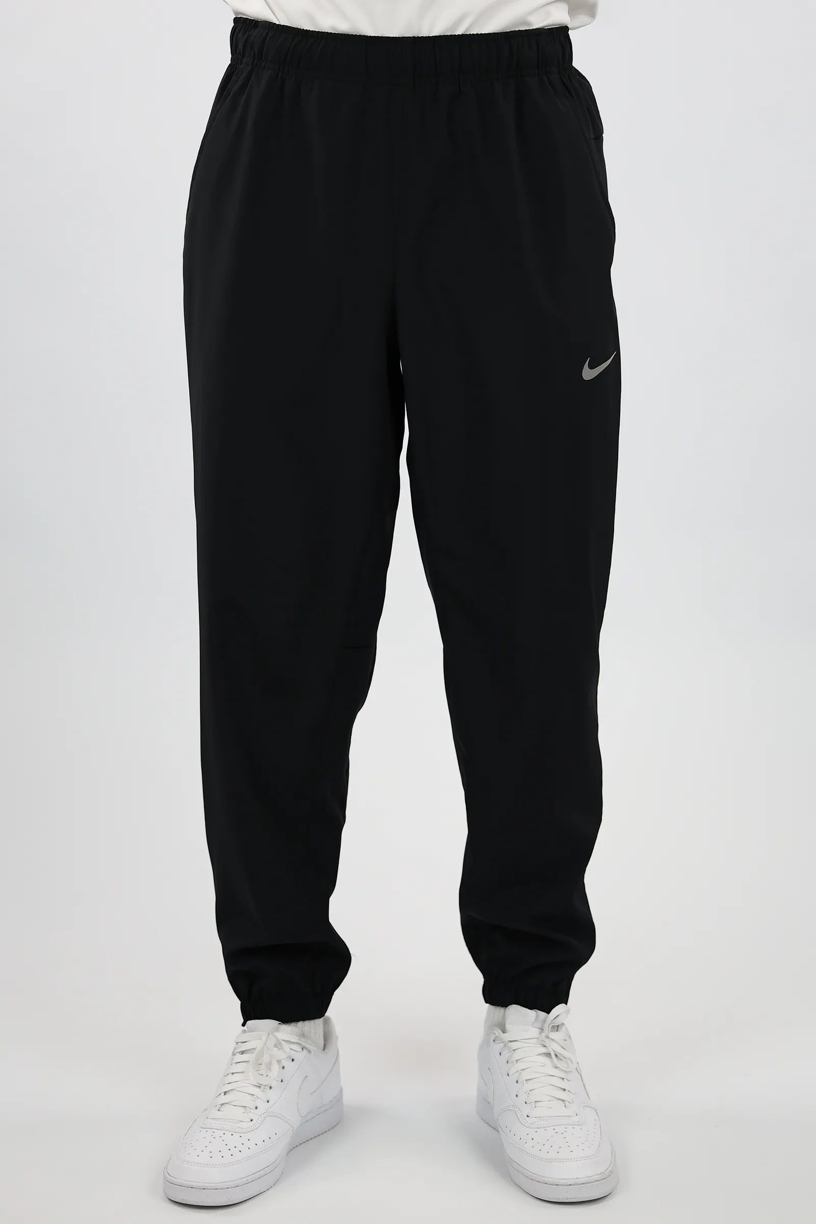 TRENERK NIKE DRI-FIT TAPERED VERSATILE TROUSERS