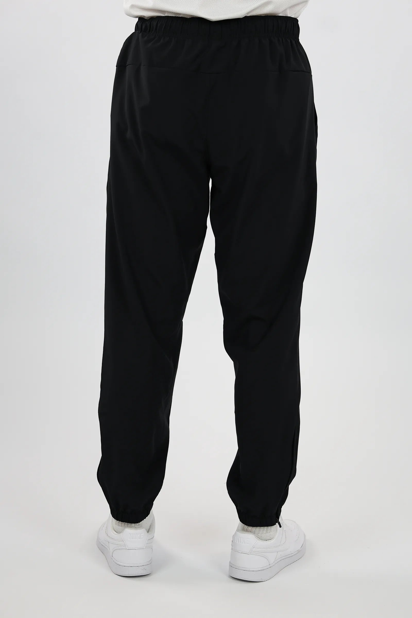 TRENERK NIKE DRI-FIT TAPERED VERSATILE TROUSERS