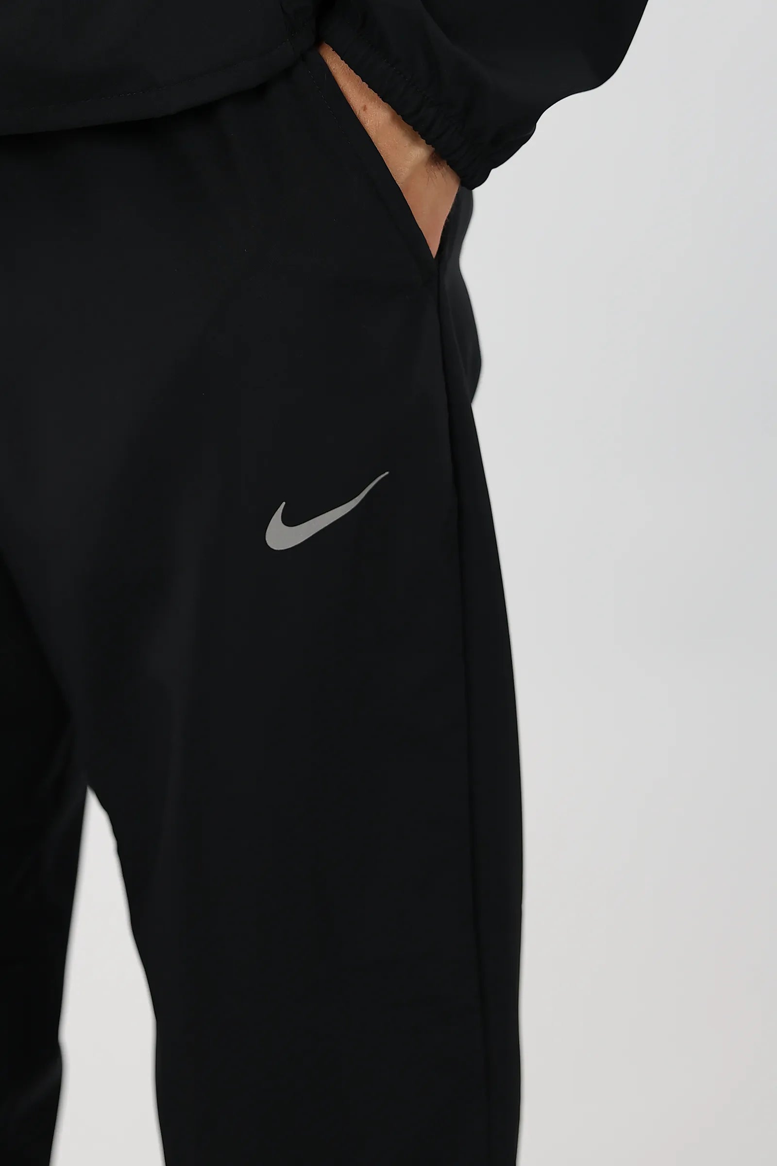 TRENERK NIKE DRI-FIT TAPERED VERSATILE TROUSERS